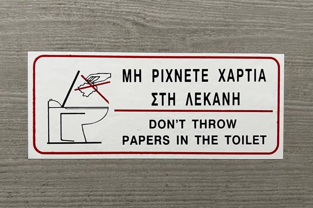 panneau toilettes grecques