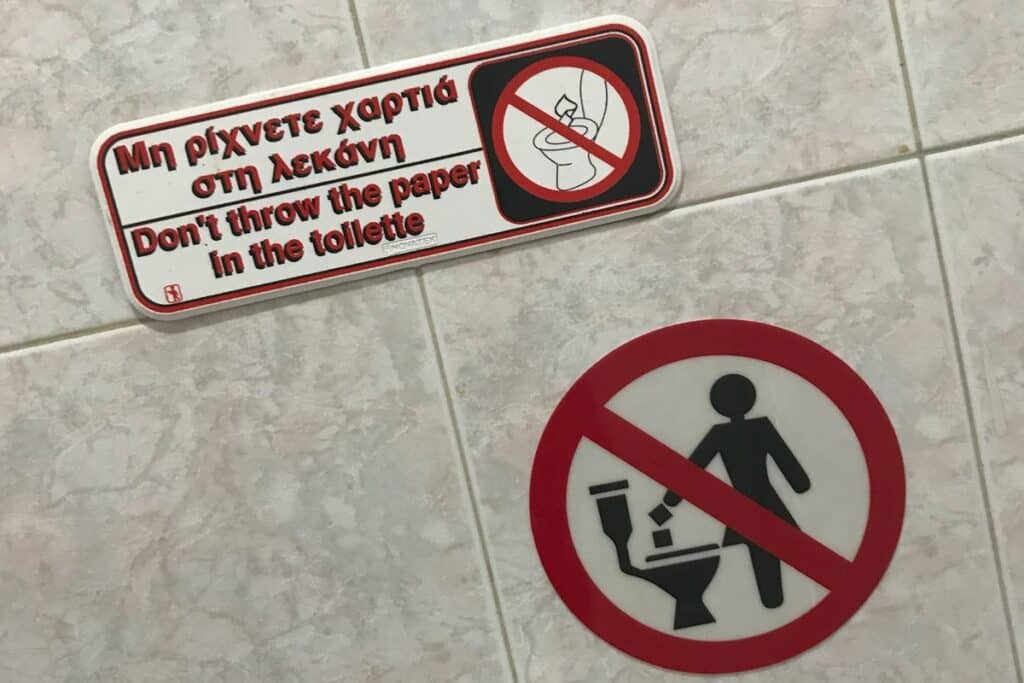 panneau toilettes grecques ne pas jeter papier